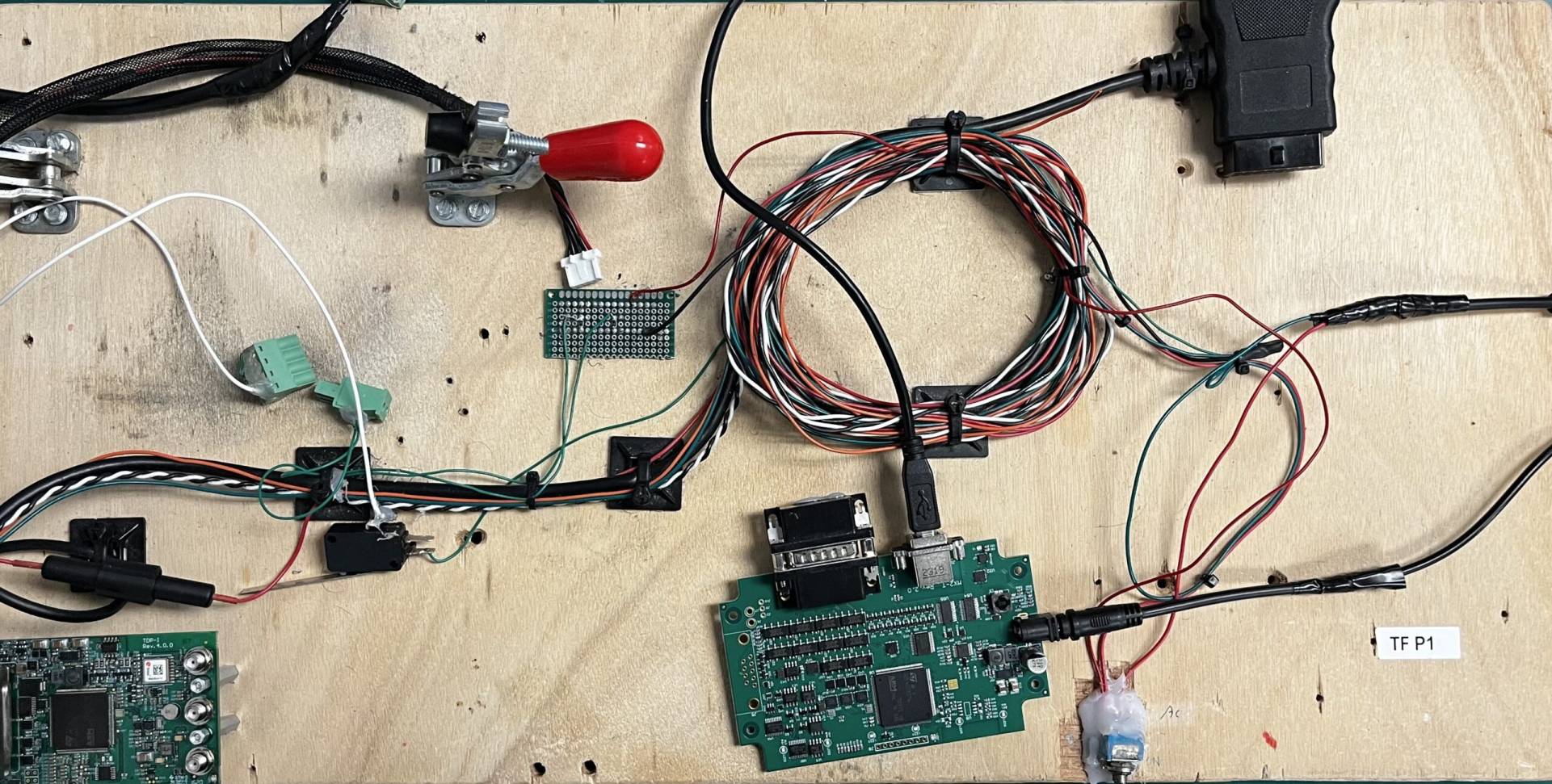 Potting of multiple small circuit boards with neatly organized wires, ensuring durability and protection for electronic components at MAKS Inc.