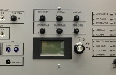 Validation rack featuring multiple control panels and test equipment for electronic system validation at MAKS Inc.